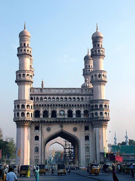 Charminar rising over the Old City of Hyderabad at golden hour